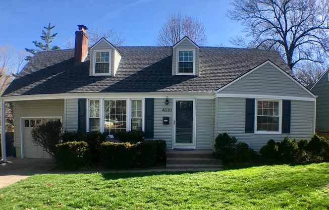 {4030} Charming Prairie Village 1.5 Story + Updates Throughout + Fantastic Fenced Yard + Ample Living Space + Screened in Porch