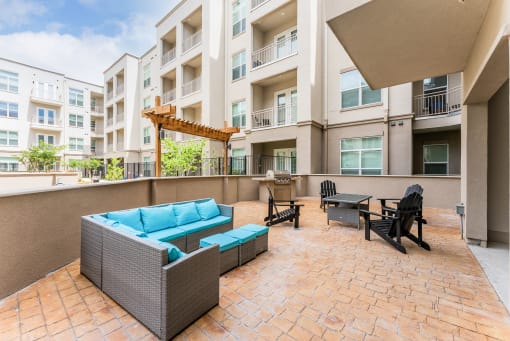 Courtyard Patio With Ample Sitting at Residences at 3000 Bardin Road, Grand Prairie, Texas