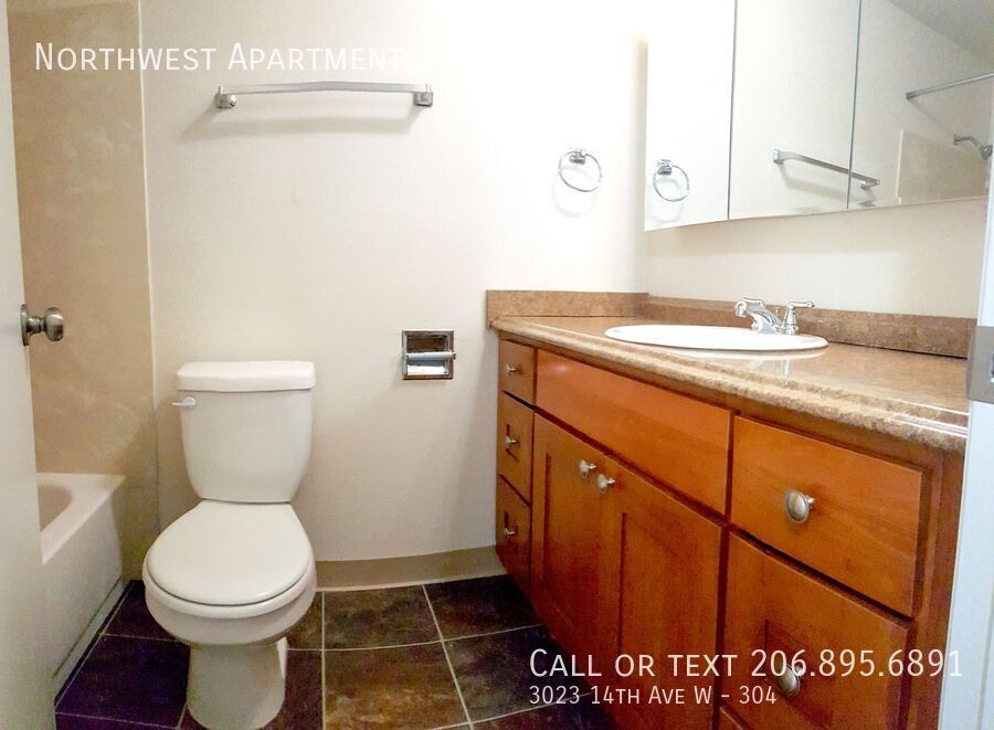 3023 14 AVE W