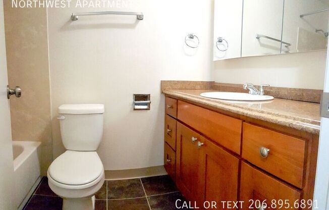 3023 14 AVE W