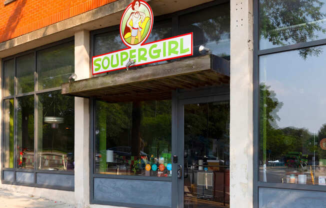 A storefront with a sign that says