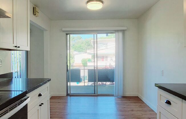 San Carlos: Updated 1 Bed 1 Bath Apartment in San Carlos Hills w/ Private Balcony, Parking, Storage, & Laundry Onsite