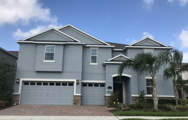 7 BEDROOM 4 BATH AT INDEPENDENCE WINTER GARDEN POND VIEW NOT REAR NEIGHBOR
