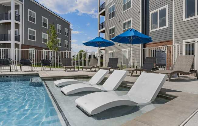 Swimming Pool And Relaxing Area at The Edison at Chapel Hills, Colorado, 80920