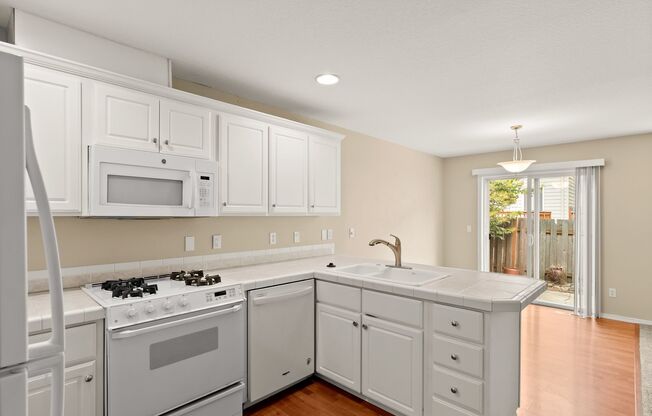 MUST SEE!!! This well-maintained 3 bedroom, 2.5 bath Townhouse