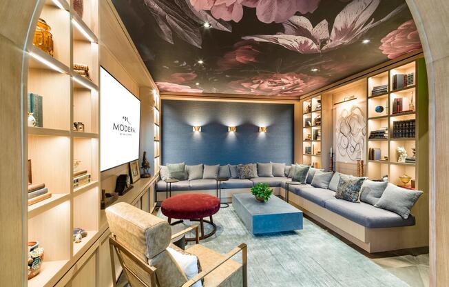 An artfully designed resident lounge at Modera University Park, offering a refined place to unwind just minutes from the heart of University Park.