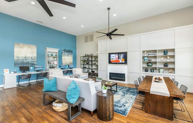 a living room filled with furniture and a wood floor