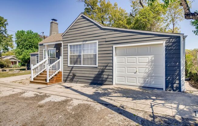 Location, Location, Location! Updated one story home with charm and modern conveniences