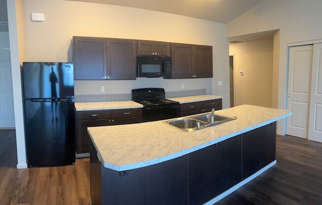 Moen Fields 3 Bed 3 Bath Garden Townhome across from Greenacres Elementary