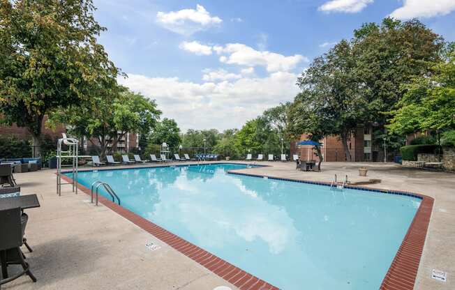 Swimming Pool With Lounge Chairs at Columbia Pointe, Columbia, Maryland