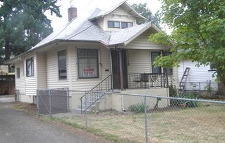 Adorable home with nice amenities!  yard, carport, Walk to shops & Bus!
