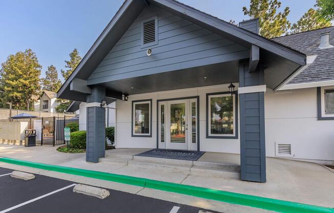 a close up of a street in front of a house