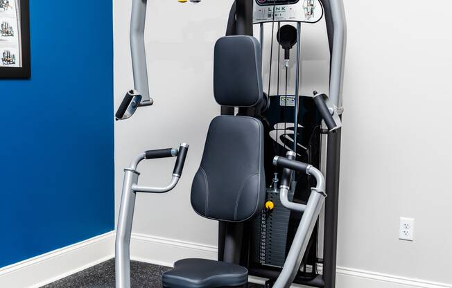 a gym with a exercise machine in a room