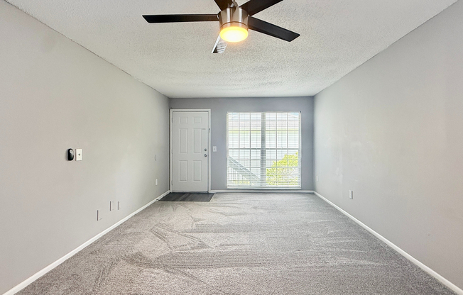 Premium One-Bedroom - Living Room - Carpet Option