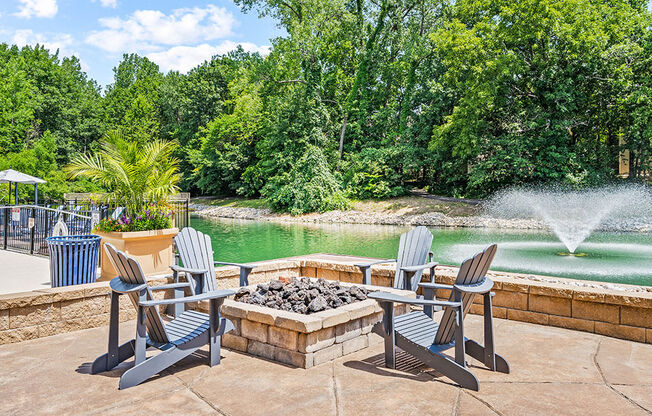 seating area with chairs next to water fountain