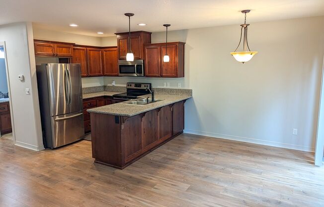 407 AND 409 MADRONA AVE SE