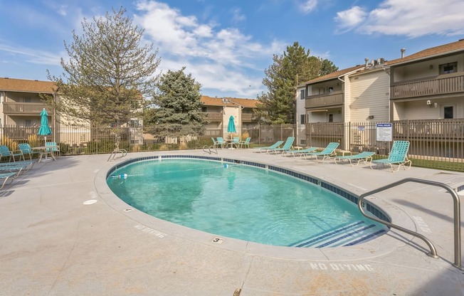 our apartments have a resort style pool with chairs