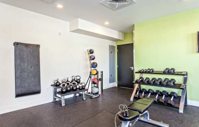 the gym at the flats at big tex apartments