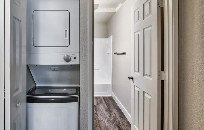 a laundry room with a washer and dryer