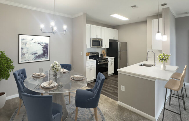 an open kitchen and dining room with a table and chairs