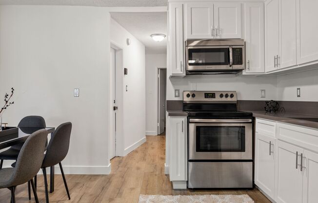 A 6 bedroom, 3 bathroom apartment with a dining/living room & a fully functional kitchen at 1700 Malcolm Unit 101