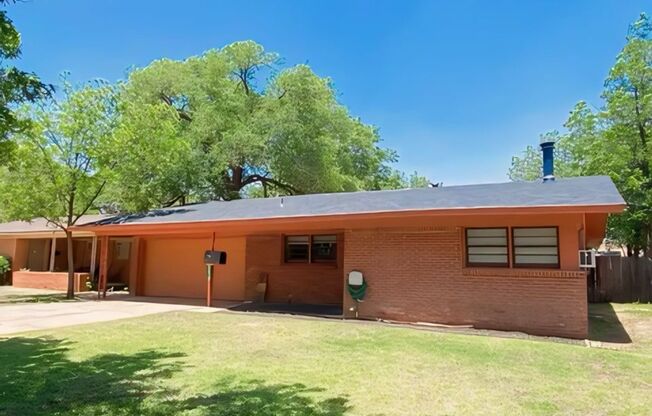 Adorable, updated and spacious brick home!