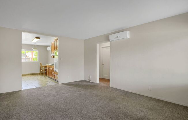 Charming 2 Bed 1 Bath Duplex Unit with Beautifully Landscaped Backyard