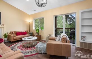 Stylish Top-Floor 2BR/2BA Condo with Vaulted Ceilings, Greenspace Views & Garage!