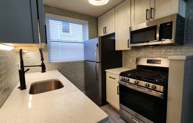 **One Bedroom Located in Clayton***Brand New Rehabbed Apartment***In Unit Washer/Dryer + Covered Parking***