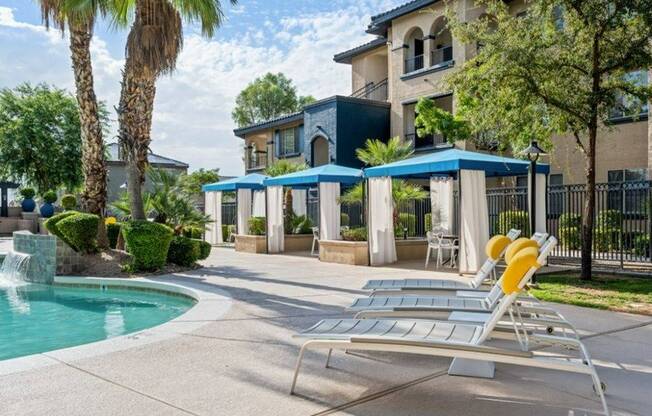 Pool with water feature at Lunaire Apartments | Goodyear, Arizona