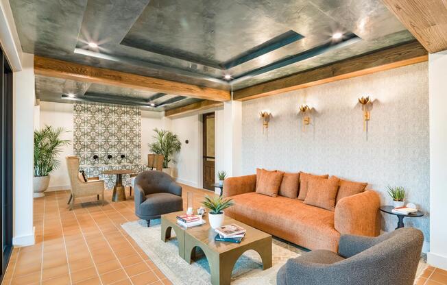 Relax or gather with neighbors in Modera Trailhead’s inviting lounge, designed with warm textures and stylish details.