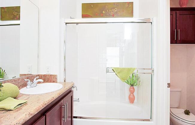 Showers with glass sliding doors at  The Croix Townhomes in Henderson, NV offers 2 and 3 bedroom Townhomes!