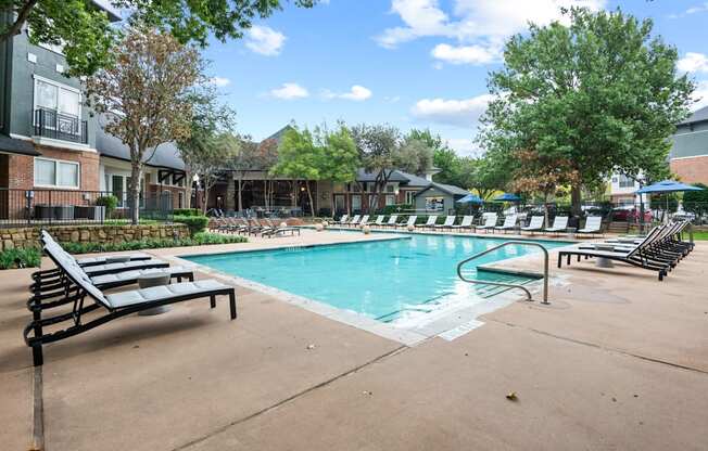 Sparkling pool with fountains at Mission Gate, Plano, TX