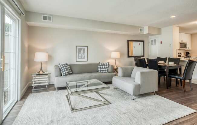 Renovated living rooms with wood plank flooring at Windsor Ridge at Westborough, Massachusetts, 01581