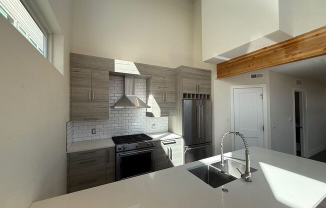 Modern End Unit Townhome with Rooftop Oasis | 2 Bedrooms, 2.5 Baths | Prime Location