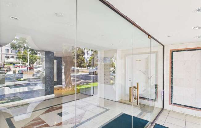 A glass wall with a view of the street outside.