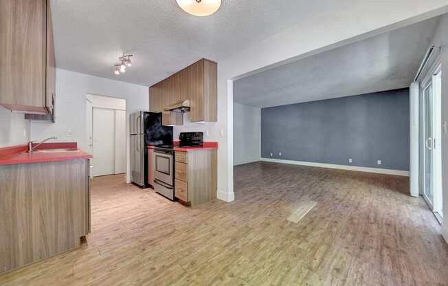 a kitchen and living room in a 555 waverly unit