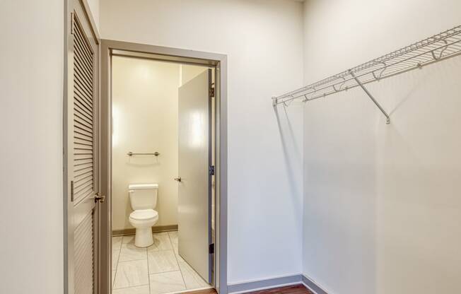 a bathroom with a shower and a toilet in it