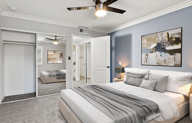 Large bedroom with ceiling fan.