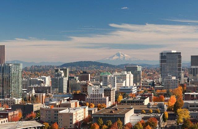 a view of a city with a mountain in the background