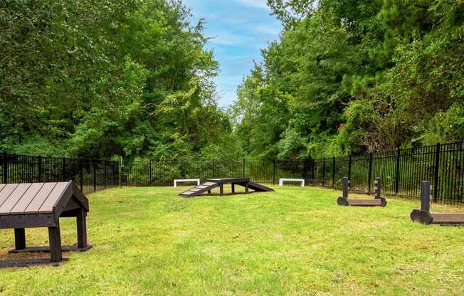 a park with a picnic table and benches