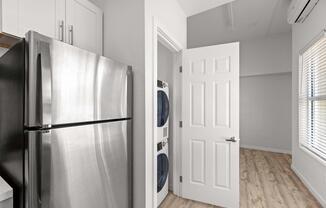 a stainless steel refrigerator in a kitchen