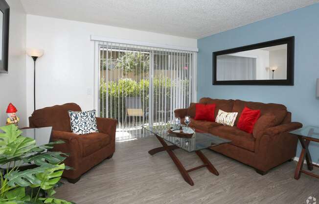 Spacious Living Room area with couch and love seat