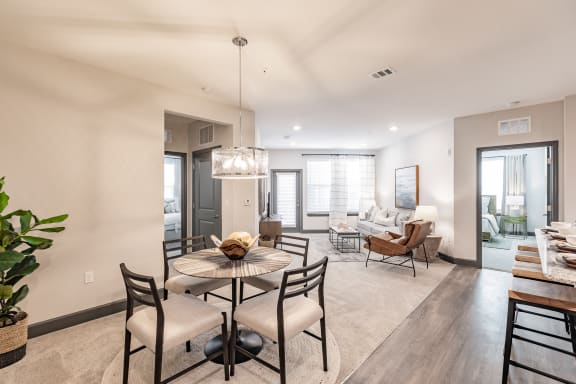 Wood style flooring and open floor plans at The Harrison, Sarasota, FL 34243