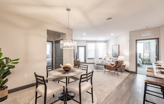 Wood style flooring and open floor plans at The Harrison, Sarasota, FL 34243