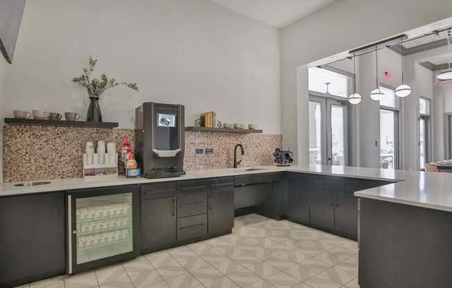 a kitchen with a large counter top and a sink at Sladestone Shadow Creek, Pearland