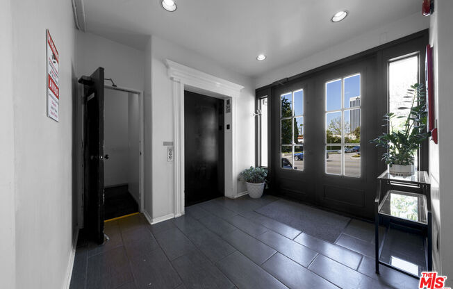 5848 W Olympic Blvd