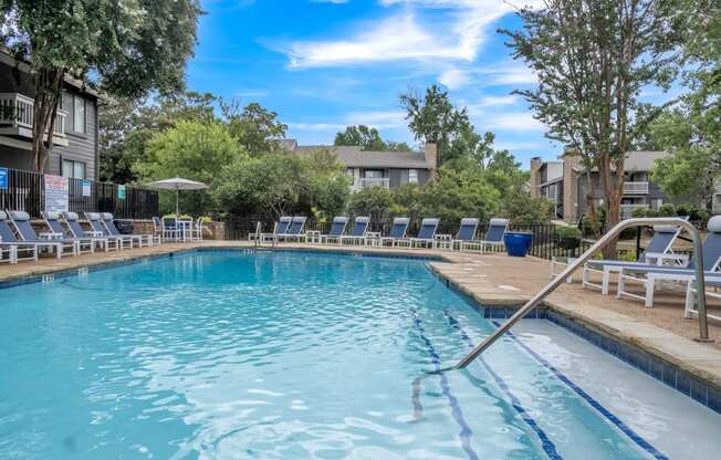 our apartments have a resort style pool with chairs