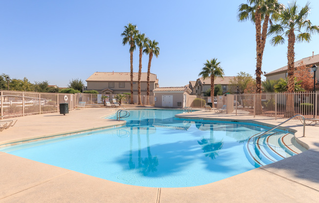 Two bedroom townhome with garage in gated Henderson community.