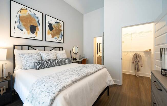 a bedroom with a bed and a closet
